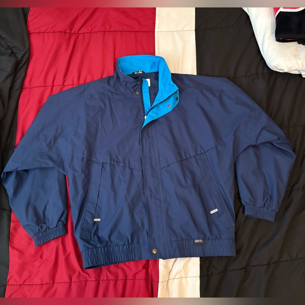 Head sports wear rain coat